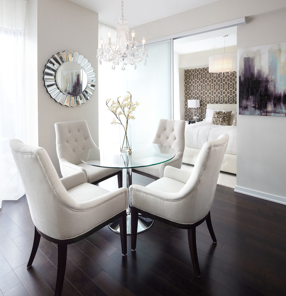 Photo of a contemporary dining room in Toronto with white walls, dark hardwood floors and brown floor.