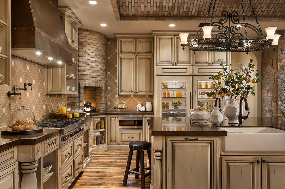 Example of a tuscan kitchen design in Phoenix