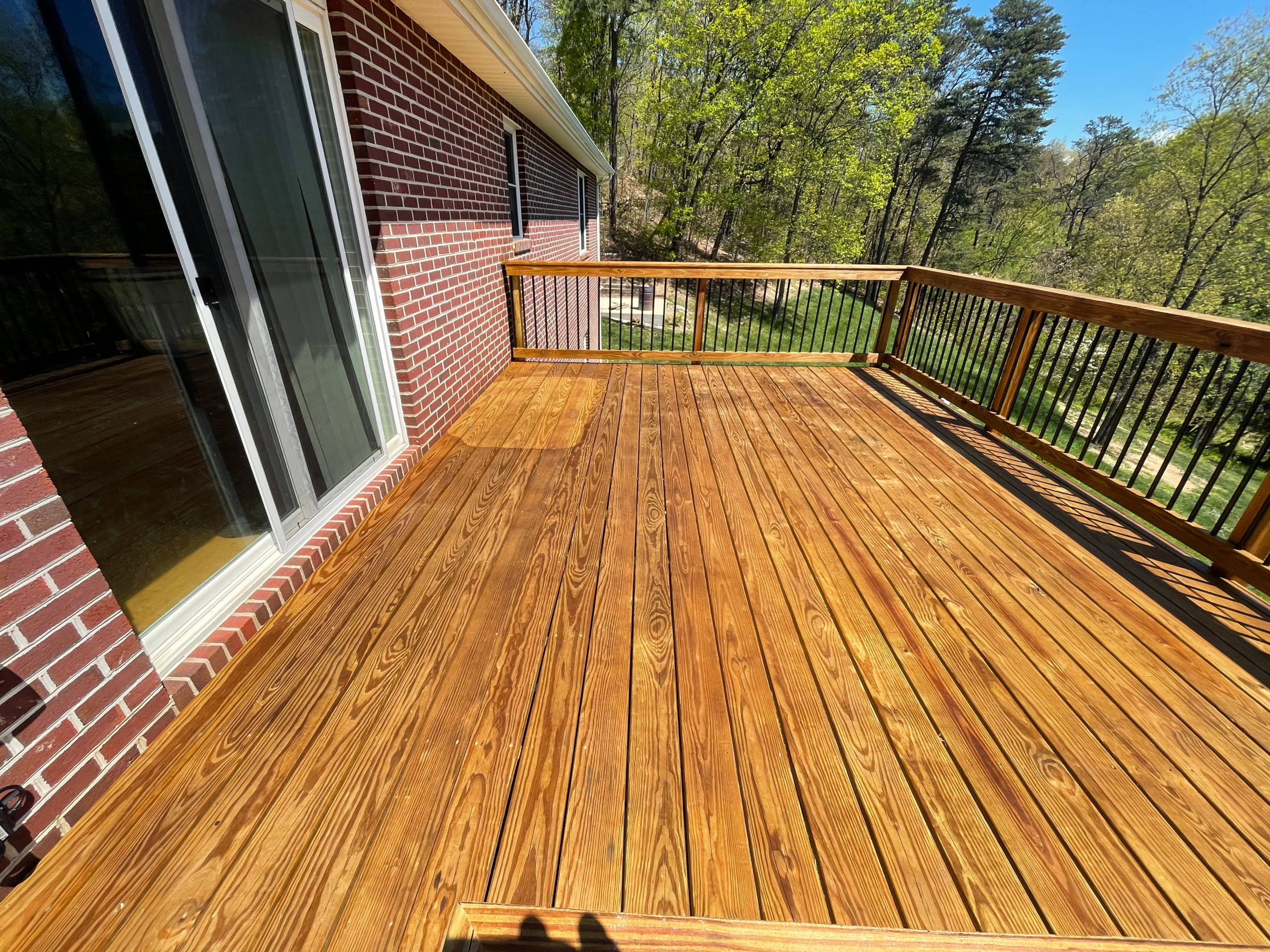 Deck stain and gutters power wash