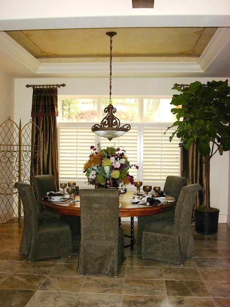 Design ideas for a mid-sized mediterranean open plan dining in Seattle with white walls.