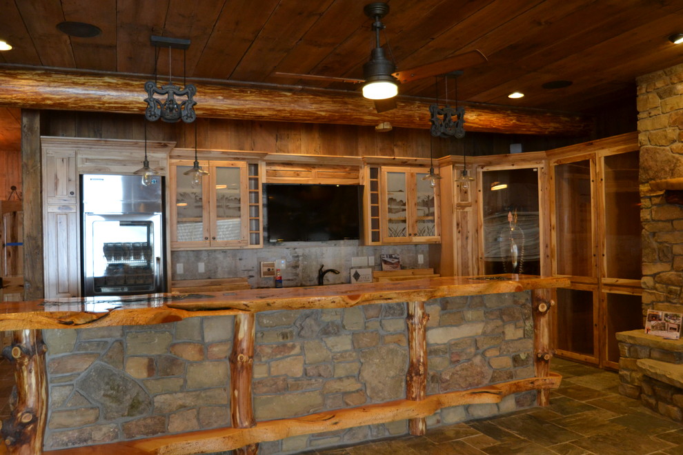 Example of a large mountain style home design design