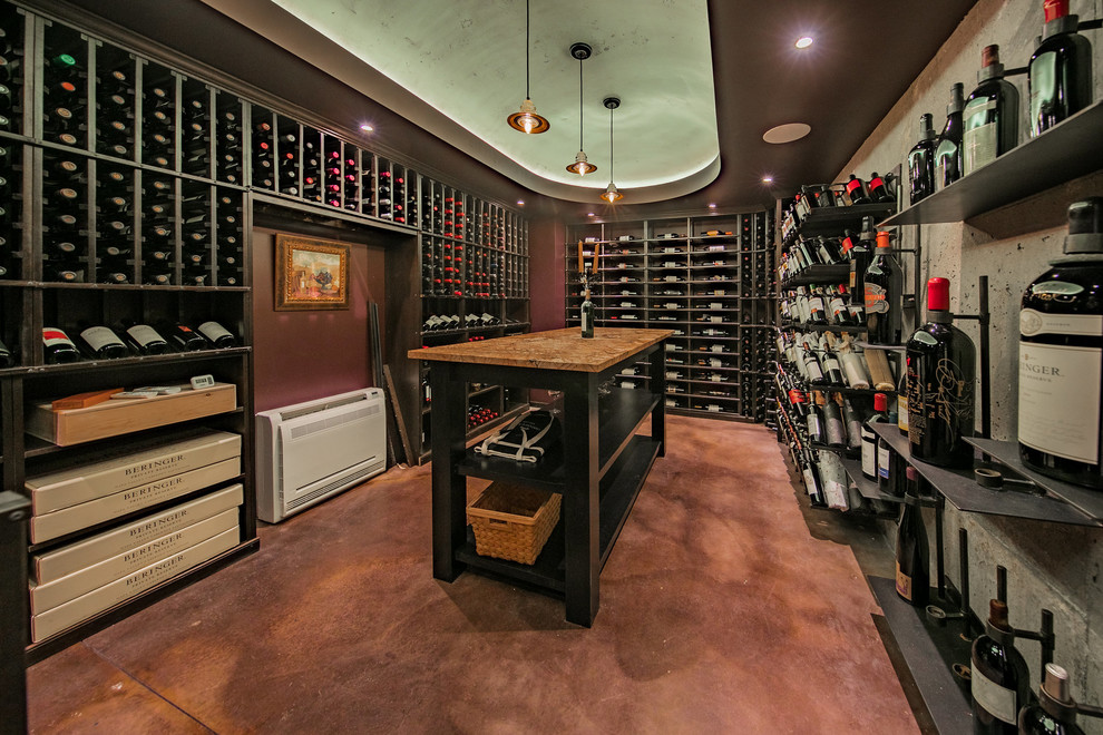 Design ideas for an industrial wine cellar in Salt Lake City with display racks and multi-coloured floor.