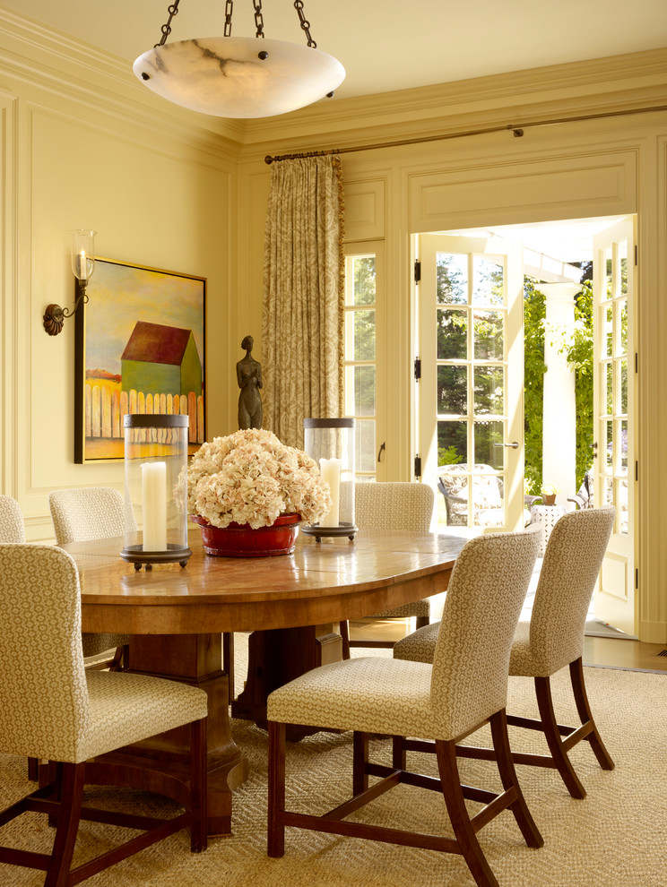 This is an example of a traditional dining room in San Francisco with beige walls.