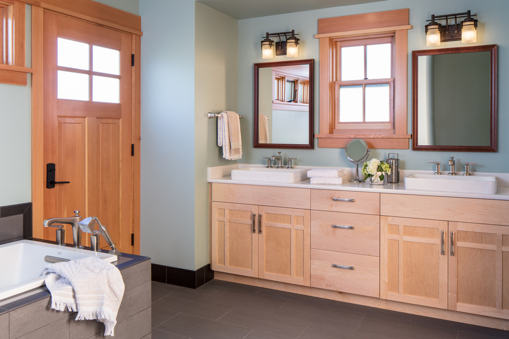 Arts and crafts master bathroom in Other with light wood cabinets, a drop-in tub, green walls, a vessel sink, grey floor, beige benchtops and recessed-panel cabinets.