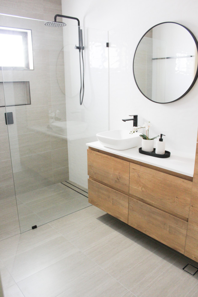 Example of a small minimalist master white tile and porcelain tile porcelain tile and gray floor bathroom design in Perth with flat-panel cabinets, light wood cabinets, white walls, a vessel sink, quartz countertops, white countertops and a floating vanity