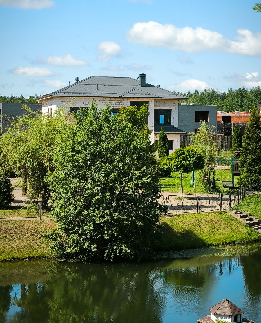 Современный дом с баней и террасой