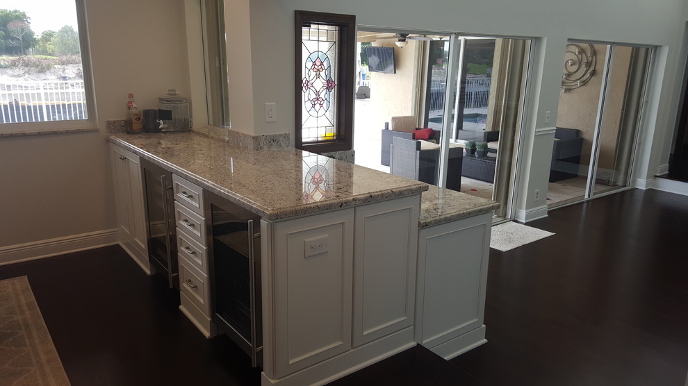 Inspiration for a transitional home design remodel in Miami