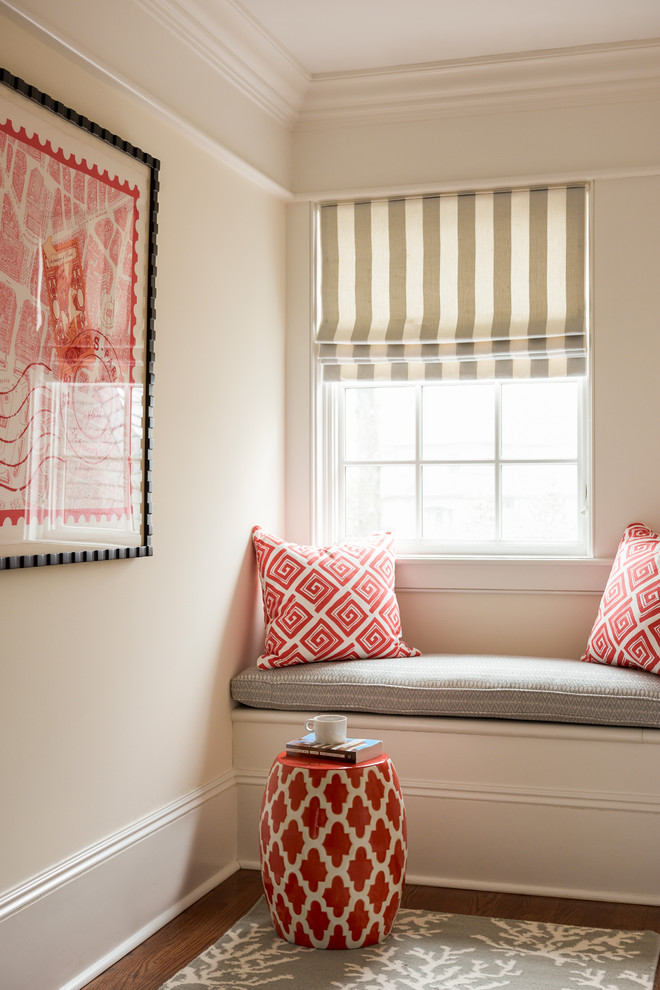 Design ideas for a small transitional hallway in New York with white walls and medium hardwood floors.