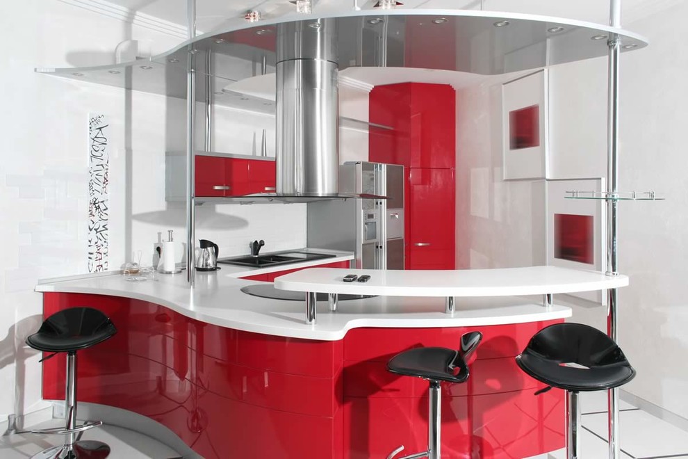 Mid-sized modern u-shaped eat-in kitchen in Phoenix with a double-bowl sink, flat-panel cabinets, red cabinets, white splashback, stainless steel appliances, a peninsula and white floor.