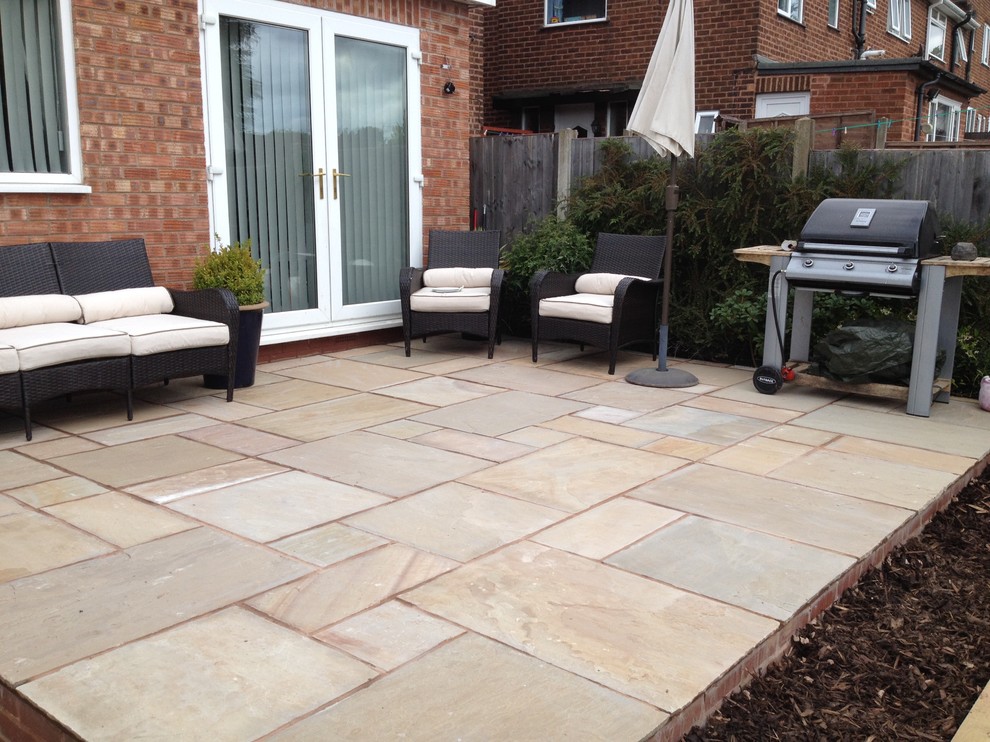 This is an example of a contemporary patio in West Midlands.
