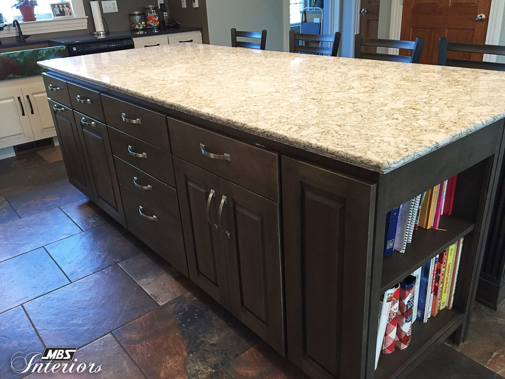 Home design - transitional l-shaped home design idea with a farmhouse sink, white cabinets, quartz countertops, stainless steel appliances and an island