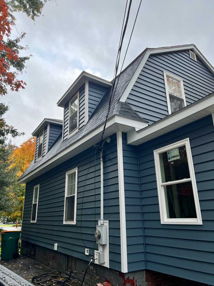 Four season room and vinyl siding