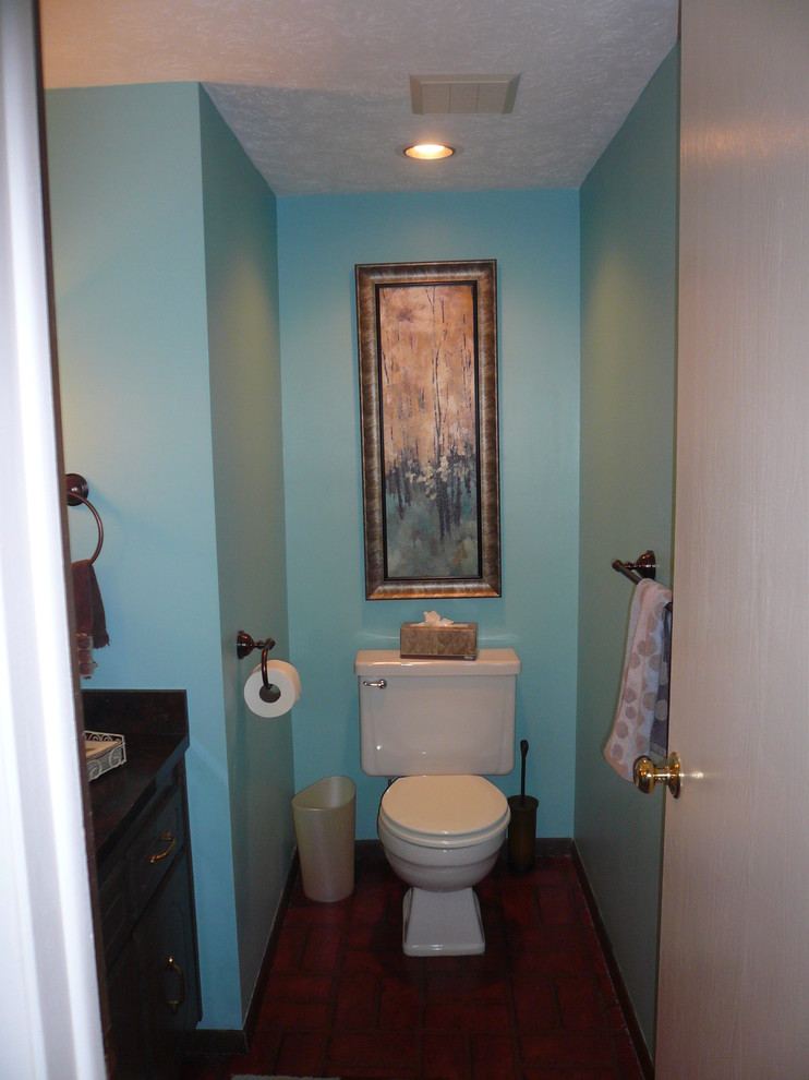 Photo of a transitional powder room in Cleveland.