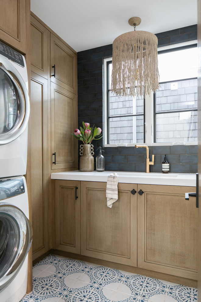 Inspiration for a beach style laundry room in Orange County.