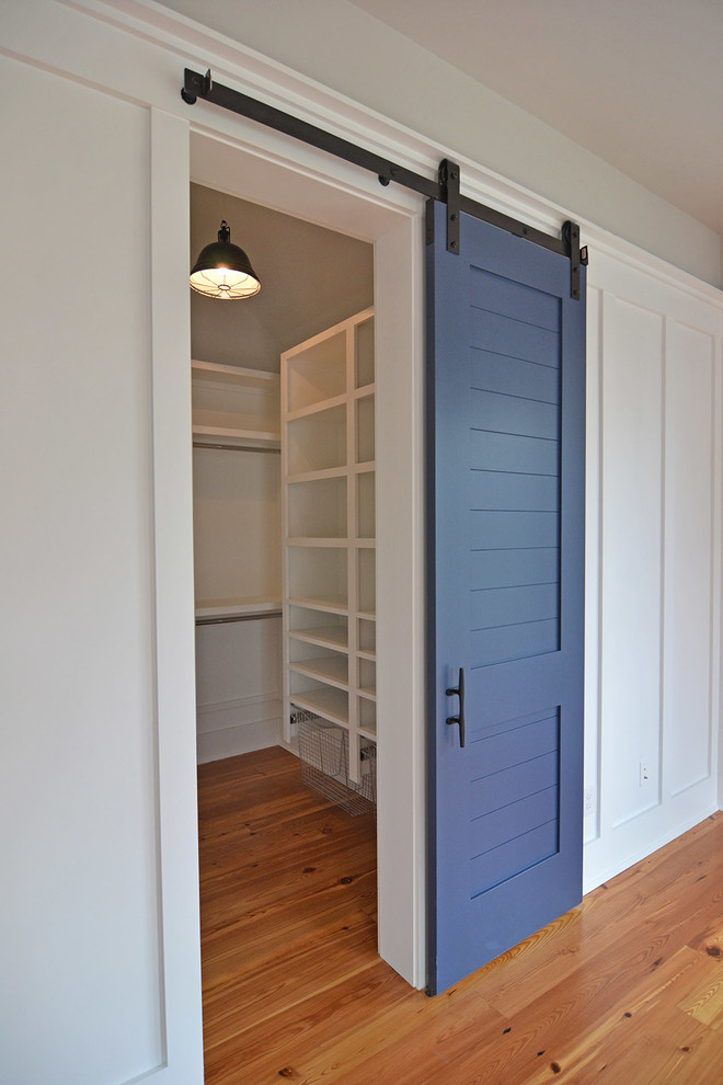 Inspiration for a beach style gender-neutral storage and wardrobe in Charleston.