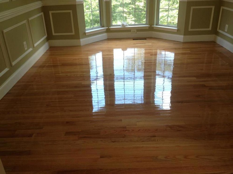 Mid-sized transitional light wood floor enclosed dining room photo in Baltimore with green walls