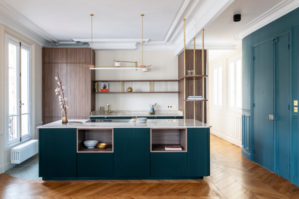 Design ideas for a large midcentury galley open plan kitchen in Paris with a single-bowl sink, beaded inset cabinets, green cabinets, marble benchtops, beige splashback, marble splashback, panelled appliances, cement tiles, with island, green floor and beige benchtop.