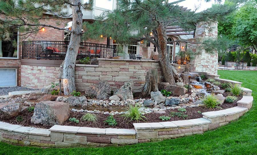 Denver Colorado Backyard Patio above Water Feature Transitional