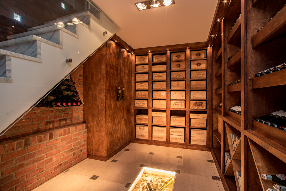 Design ideas for a transitional wine cellar in Buckinghamshire with marble floors and white floor.