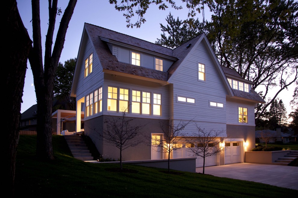 Design ideas for a contemporary exterior in Minneapolis with wood siding and a gable roof.