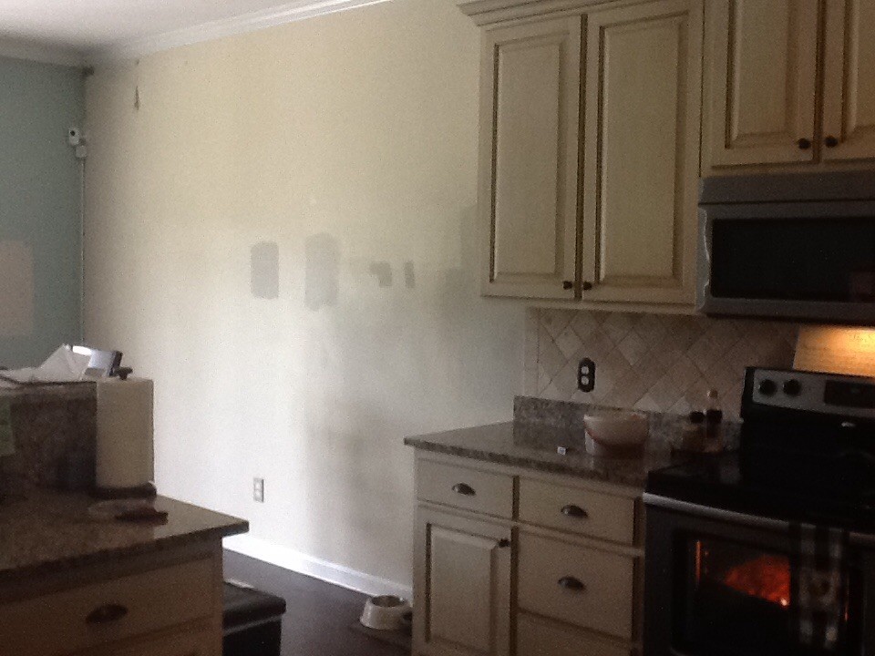 wall color that will work with cream with brown glaze kitchen