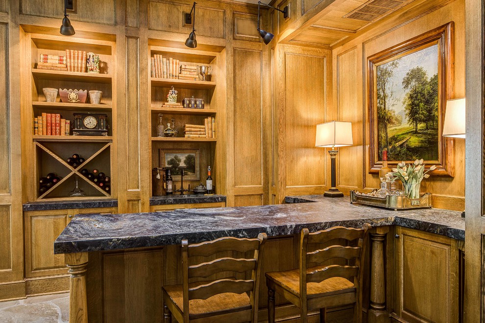 Traditional seated home bar in Other with open cabinets and medium wood cabinets.
