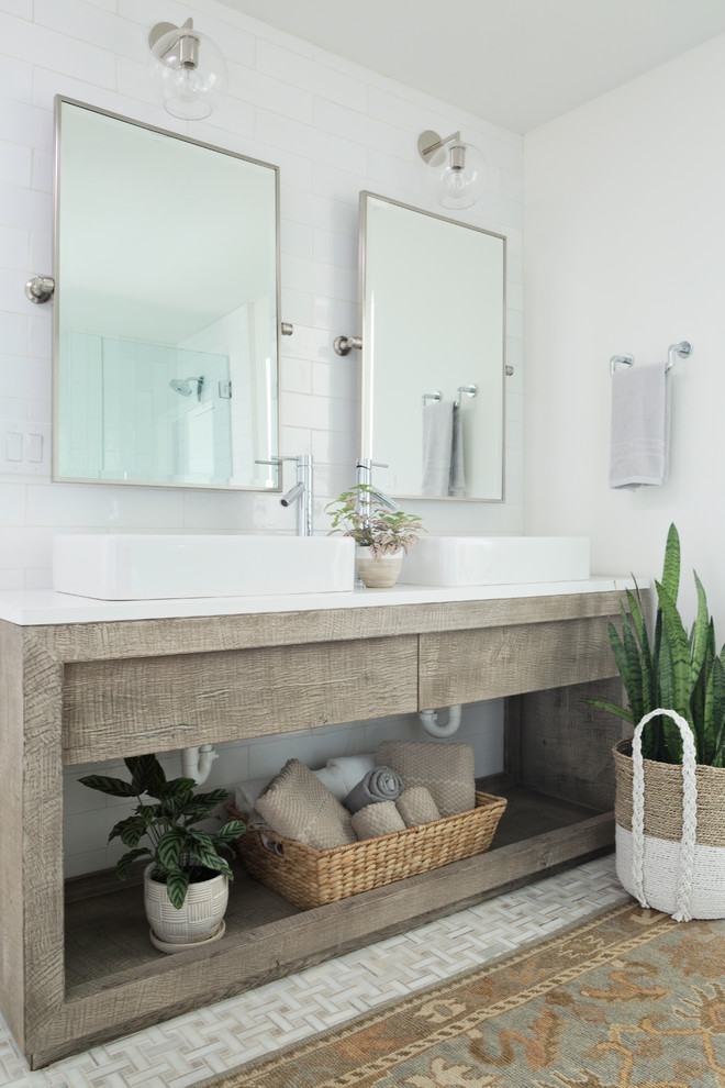 Design ideas for a beach style master bathroom in Tampa with white tile, white walls, a vessel sink, subway tile, white benchtops, quartzite benchtops and flat-panel cabinets.