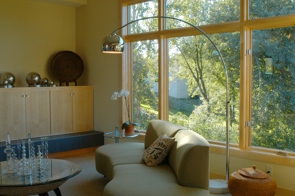 This is an example of a contemporary living room in Minneapolis with beige walls.