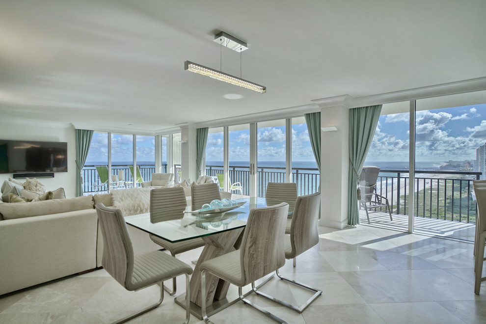 Photo of a contemporary open plan dining in Miami with white walls.