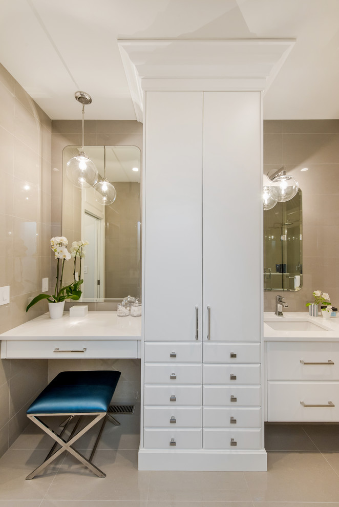 Bathroom - mid-sized transitional master beige tile and ceramic tile ceramic tile bathroom idea in Calgary with flat-panel cabinets, white cabinets, beige walls, an undermount sink and quartz countertops