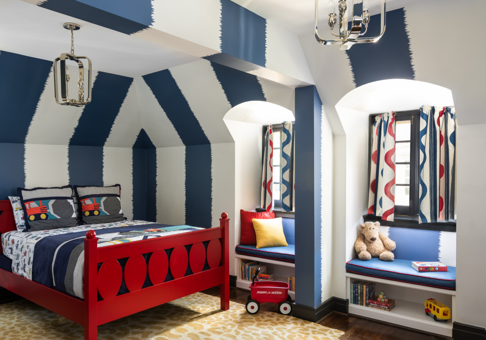 Large traditional kids' bedroom for boys in St Louis with blue walls, medium hardwood flooring, brown floors, exposed beams and wallpapered walls.