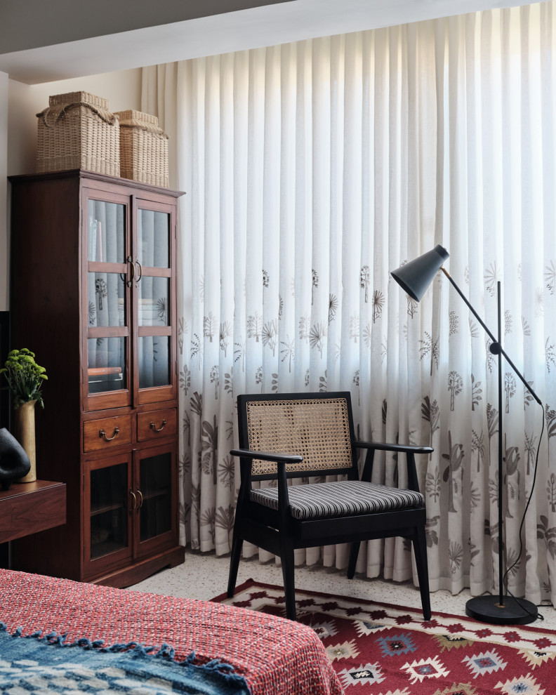 Photo of a tropical bedroom in Bengaluru.