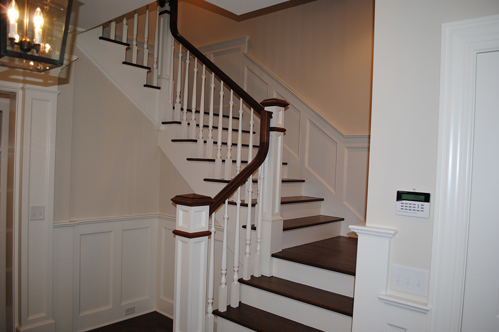 Staircase - large transitional wooden u-shaped wood railing staircase idea with painted risers