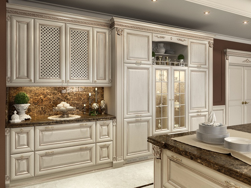 This is an example of a mid-sized traditional u-shaped eat-in kitchen in Other with a double-bowl sink, raised-panel cabinets, beige cabinets, quartzite benchtops, brown splashback, marble splashback, coloured appliances, porcelain floors, with island, beige floor and brown benchtop.