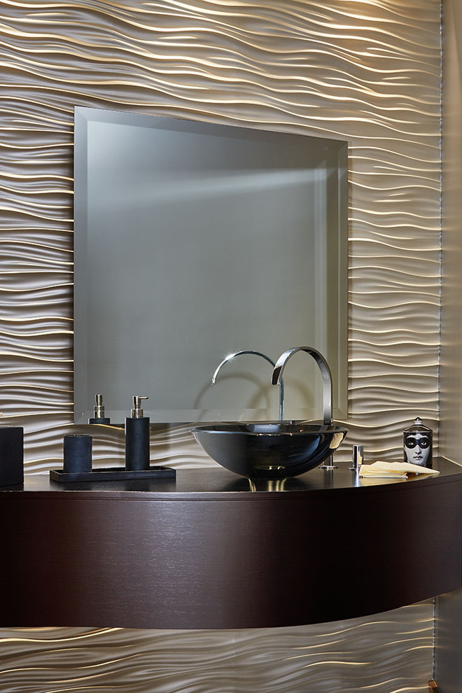 Inspiration for a contemporary powder room in San Diego with dark wood cabinets and a vessel sink.