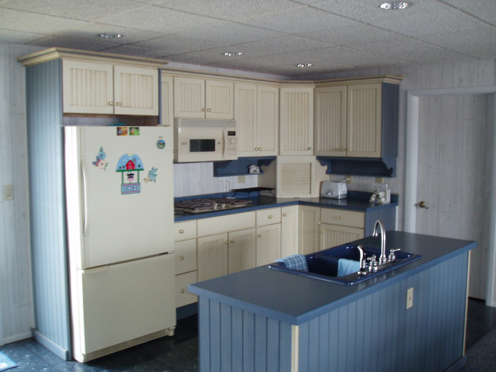 Eat-in kitchen - mid-sized l-shaped ceramic tile and blue floor eat-in kitchen idea with a double-bowl sink, louvered cabinets, beige cabinets, laminate countertops, white appliances, an island and blue countertops