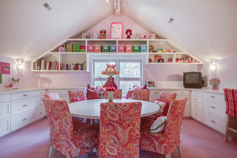 Design ideas for a large traditional kids' playroom for girls and kids 4-10 years old in Grand Rapids with pink walls and carpet.