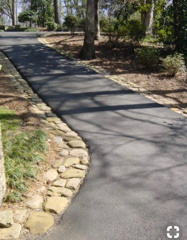 Need Curb Appeal! Driveway Landscaping and very large front rock bed
