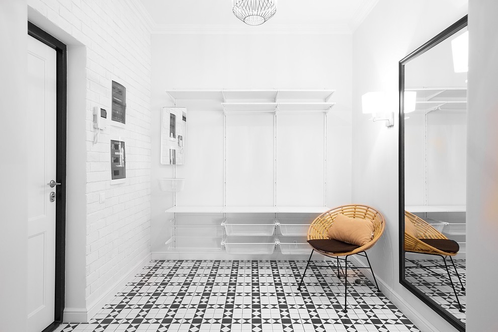 Design ideas for a contemporary foyer in Moscow with white walls, a single front door, a white front door and multi-coloured floor.