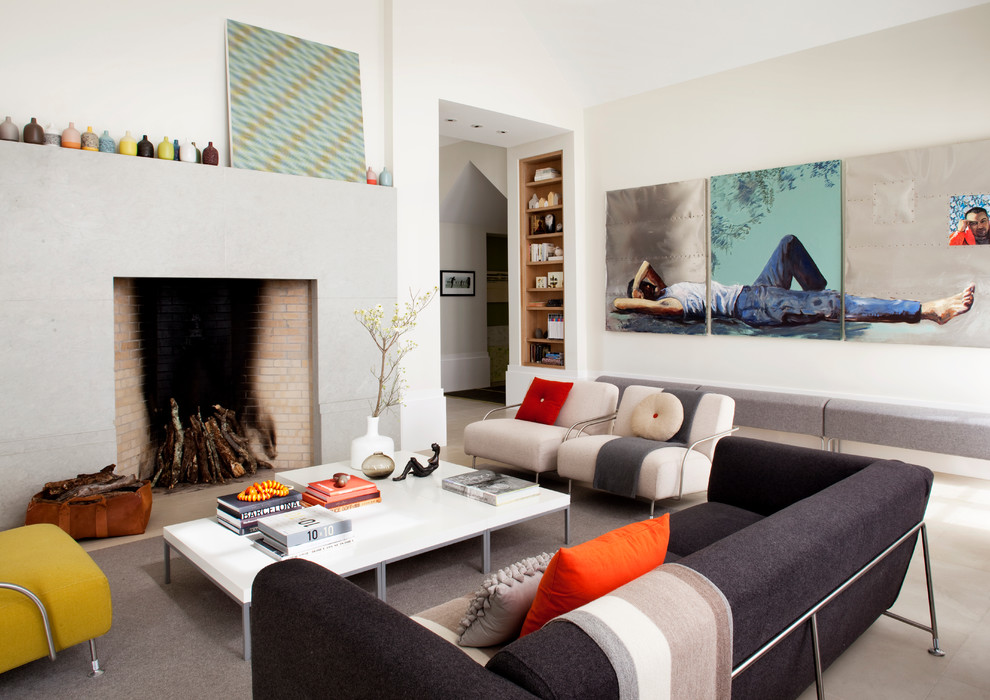 Contemporary living room in San Francisco with white walls, a standard fireplace, a concrete fireplace surround and no tv.