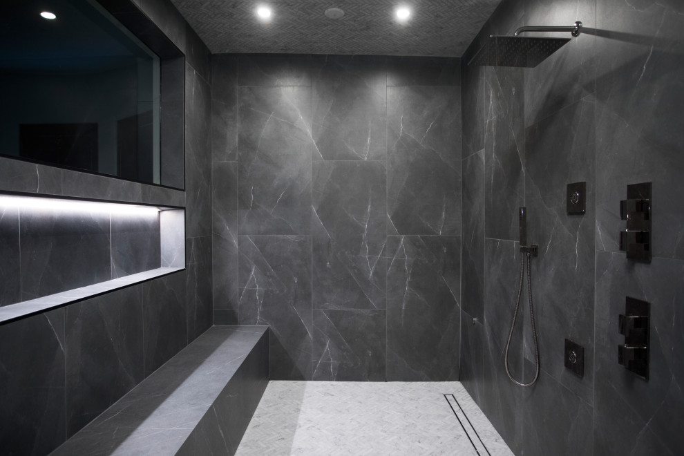 Expansive modern master bathroom in Los Angeles with flat-panel cabinets, white cabinets, a hot tub, an open shower, a bidet, gray tile, glass tile, white walls, marble floors, a wall-mount sink, engineered quartz benchtops, white floor, a hinged shower door and white benchtops.