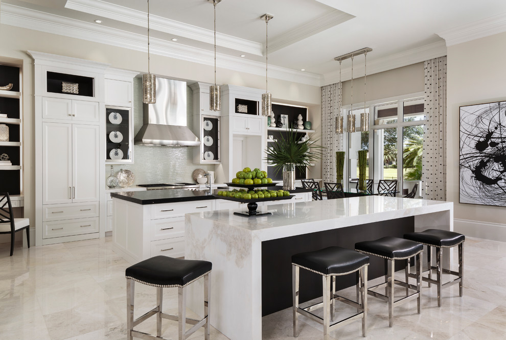 Inspiration for a transitional kitchen in Miami with shaker cabinets, white cabinets, grey splashback, multiple islands and beige floor.