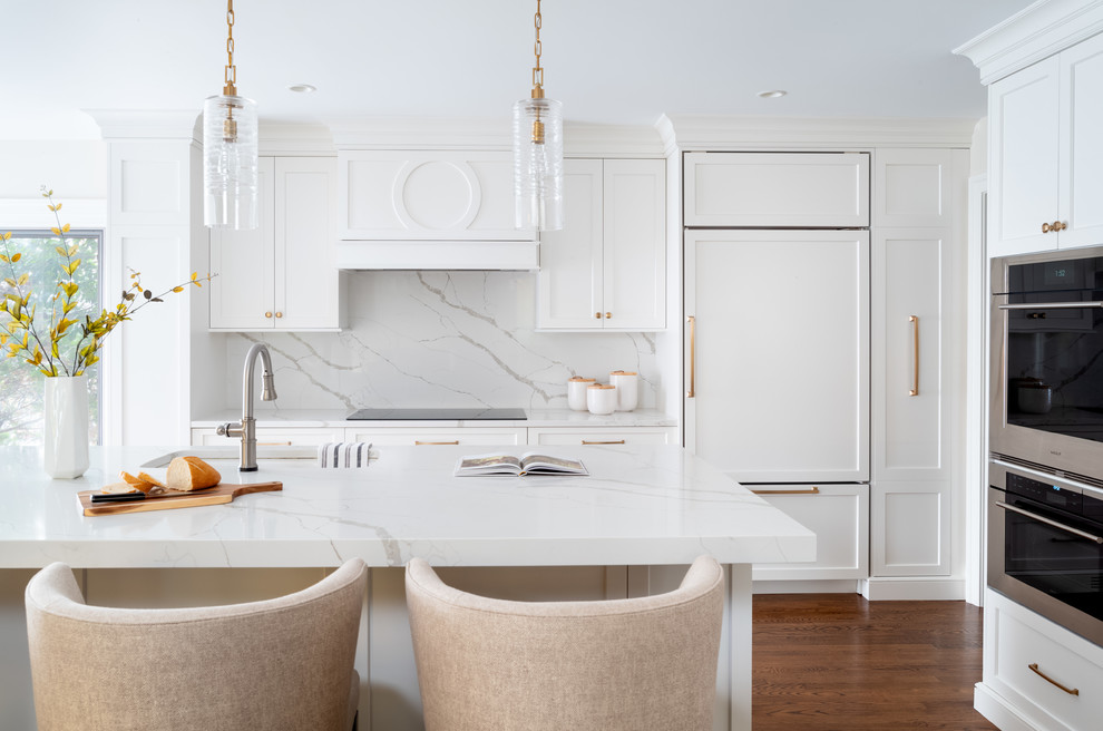 Inspiration for a transitional eat-in kitchen in Philadelphia with an undermount sink, shaker cabinets, white cabinets, quartz benchtops, stainless steel appliances, dark hardwood floors and with island.