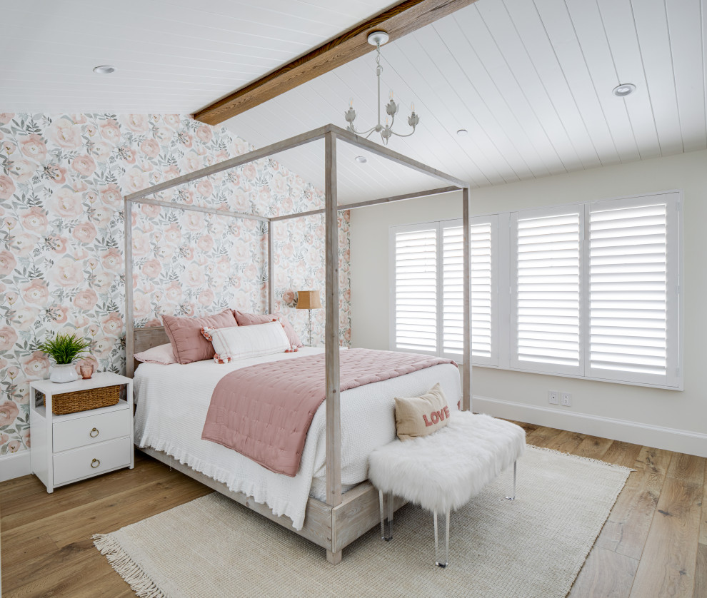 Shackleton Isle - Example of a bedroom beach style girl light wood floor, wood ceiling and wallpaper kids' bedroom design in Orange County with white walls