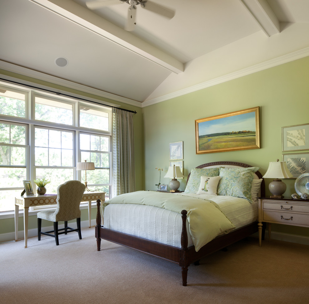 Design ideas for a traditional master bedroom in Minneapolis with green walls and carpet.