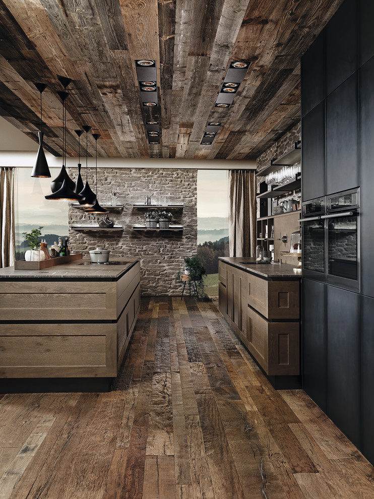 Inspiration for a large industrial galley open plan kitchen in Miami with recessed-panel cabinets, medium wood cabinets, quartz benchtops, stainless steel appliances, dark hardwood floors and with island.
