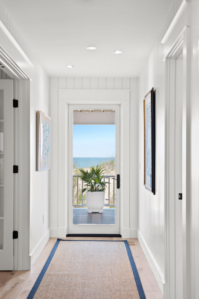 This is an example of a beach style hallway in Other.