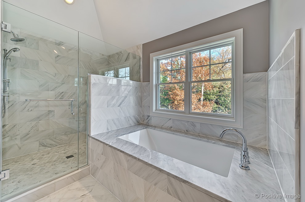 Inspiration for a mid-sized arts and crafts master bathroom in Chicago with shaker cabinets, white cabinets, an undermount tub, a corner shower, grey walls, marble floors, an undermount sink, marble benchtops, a two-piece toilet, white tile, marble, white floor and a hinged shower door.
