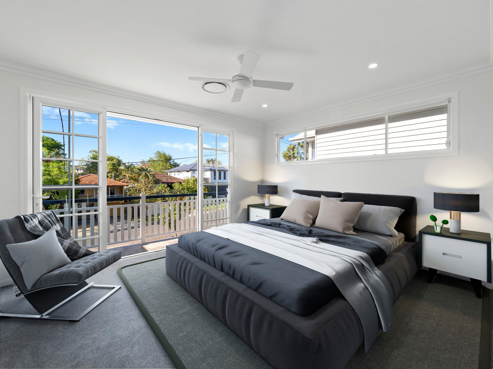 This is an example of a large contemporary master bedroom in Brisbane with white walls, carpet and grey floor.