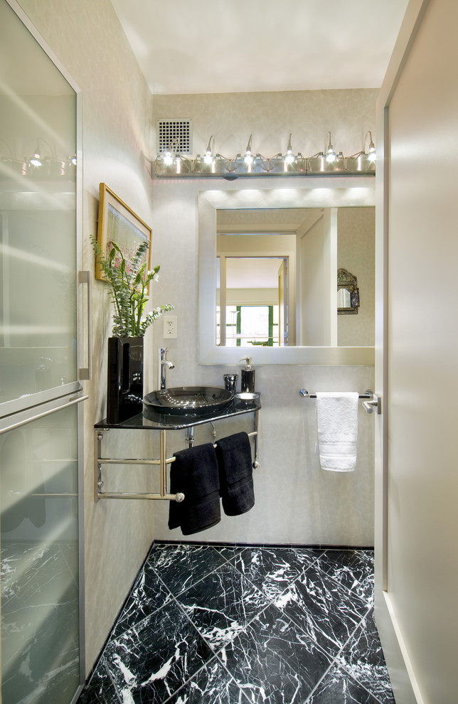 Photo of a contemporary powder room in New York.